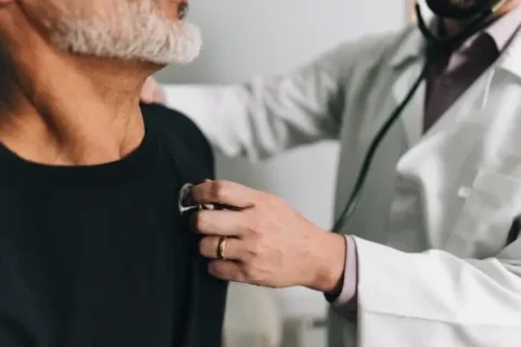 A cardiologist checks a patient’s heart in Sugar Land, TX